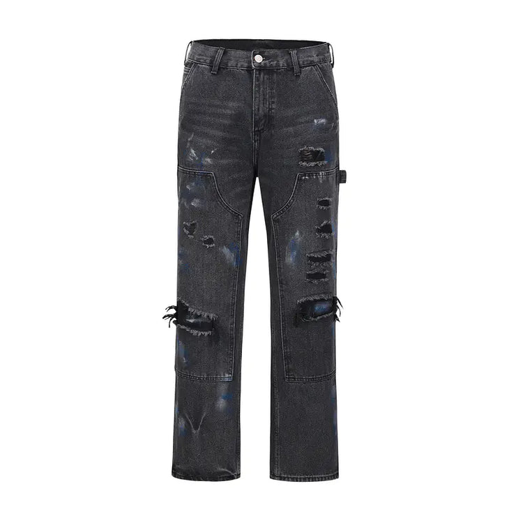 Ripped Black Zip-Up Jeans with Washed Ink Splatter