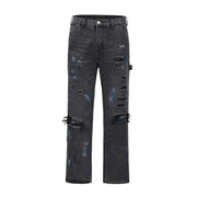 Ripped Black Zip-Up Jeans with Washed Ink Splatter