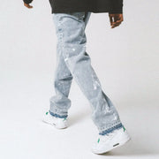 Trendy Distressed Blue Straight-Leg Jeans with Ink Details