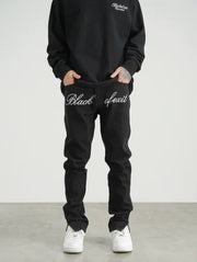 Vintage Embroidered Baggy Jeans with Washed Finish